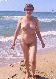 Pretty 35-year-old nudist at the beach.