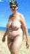 Mature flabby wife at the beach.