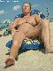 Old wife at nude beach.
