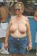 Busty Mom goes topless.