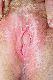 A hairy fuck slit with a big hard clit.